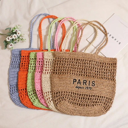 Factory direct sales of single-shoulder tote straw woven bags, new niche letter-hollowed-out woven bags, women's beach vacation bags Factory direct sales of single-shoulder tote straw woven bags, new niche letter-hollowed-out woven bags, women's beach vacation bags